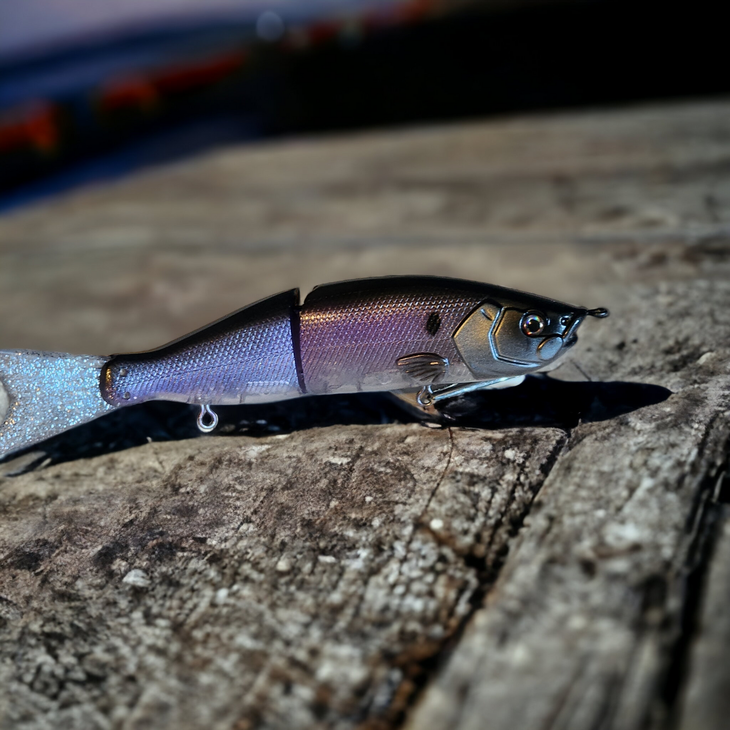 S-Waiver styled glide bait in a  see through plum color